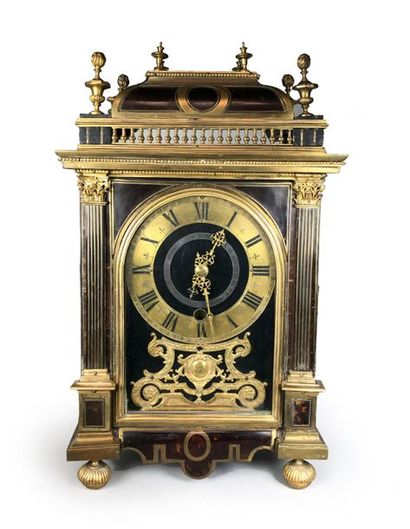null Religious clock in tortoiseshell veneer and brass, the annular dial with Roman...