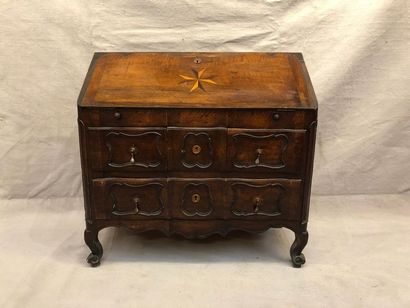 null Crossbow shaped scriban chest of drawers opening to a flap inlaid with a cross...