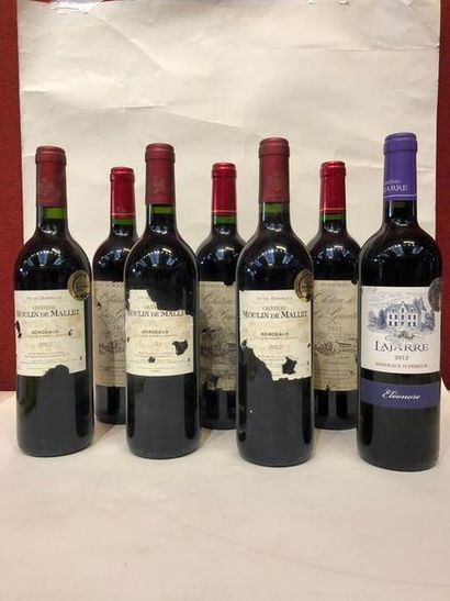 null Sept bouteilles de Bordeaux :
- trois château de la Gravette, 2012 (étiquettes...