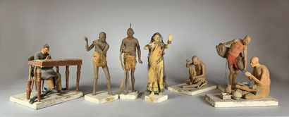 null 
Ecole française du XIXe siècle
Métiers indiens.
Sept figurines en terre cuite...