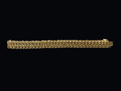 null Bracelet à maille américaine en or jaune 18K (750°/°°). 

Long. : 20,5 cm -...