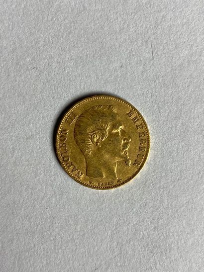 null Une pièce de vingt francs or au profil de Napoléon III, 1854.