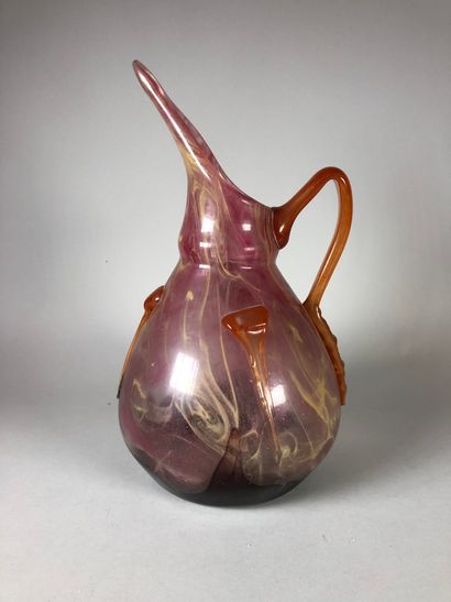 null SCHNEIDER

Large glass jug in pink and mauve with yellow inclusions. Handle...