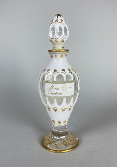 null Christian DIOR - "MISS DIOR 

Perfume bottle in white and colorless cut crystal...