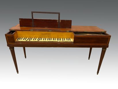 null Wooden piano-forte inlaid with fillets (jumps) resting on four tapered legs...