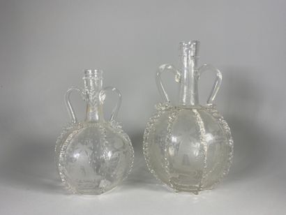 null Two bottles with two handles out of glass blown applied with hot thread (misses)...