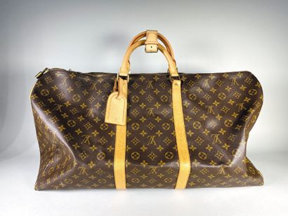 null Louis VUITTON

Sac de voyage modèle Keepall en toile monogram et cuir, intérieur...