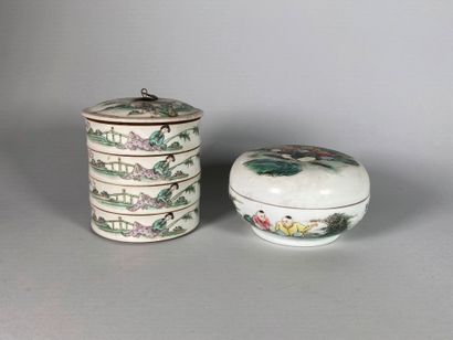 null Two porcelains including a cylindrical box with four levels with cover, decorated...