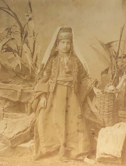 null Lot of two framed photographs:
- Felix BONFILS (1831-1885). Young Woman of Bethlehem....