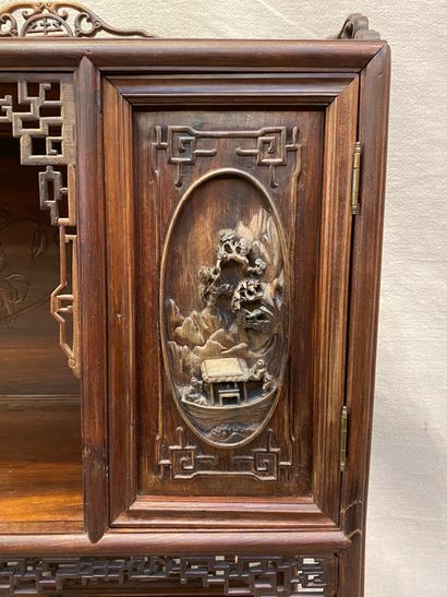null Exotic wood display cabinet with five shelves and a door.
19th century.
H :...