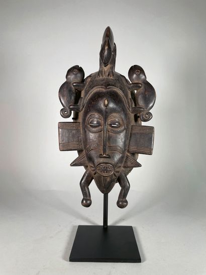 null Magnificent and ancient Senoufo mask in carved wood with black patina.
Kpélié...