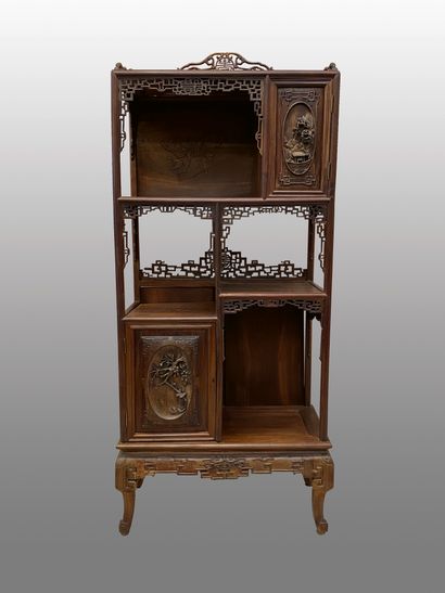 null Exotic wood display cabinet with five shelves and a door.
19th century.
H :...