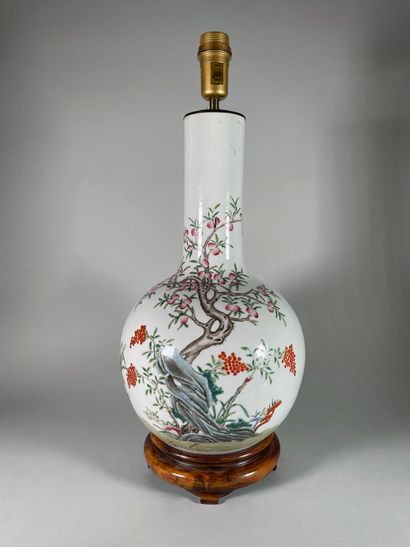 null A tianqiuping porcelain and famille rose enamel bottle vase, decorated with...