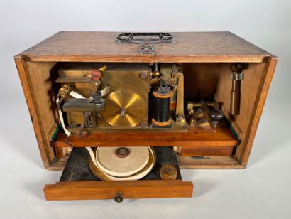 Morse code telegraph in brass on a varnished...