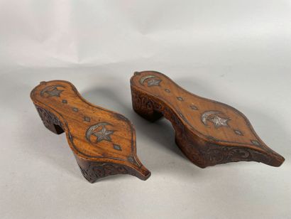 null Pair of wooden hammam soques inlaid with stars, diamonds and moons in silver...