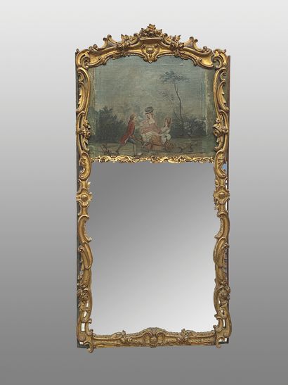 null Trumeau in molded wood, gilded and carved with flowers and staples. The mirror...