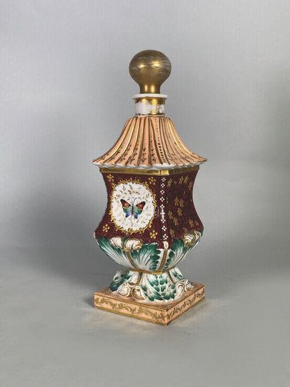 null Polychrome enameled porcelain bottle with butterflies in reserve on a burgundy...