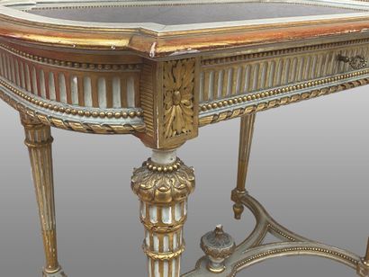 null Table forming a display case in molded, ceruse and gilded natural wood, richly...
