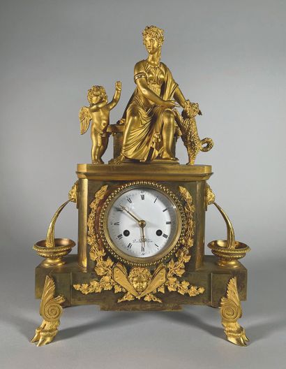 null Gilt bronze clock, the white enameled dial with Roman numerals signed DARENA...