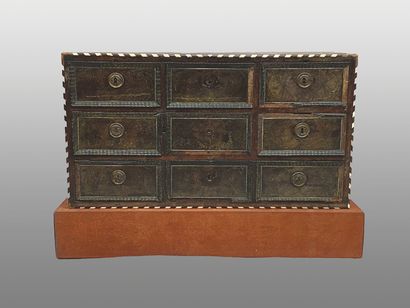 null Small cabinet in veneered wood and bone inlay, opening with six drawers simulating...