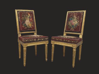 Pair of beechwood chairs, molded and gilded,...