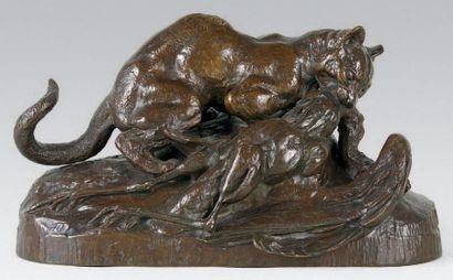 Antoine Louis BARYE (1795-1875) Ocelot emportant un héron. Belle épreuve en bronze...