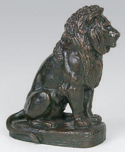 Antoine Louis BARYE (1795 - 1875) Lion assis. Epreuve en bronze à patine nuancé rouge....