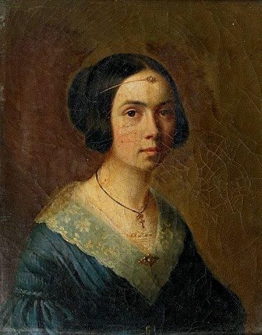 ECOLE FRANÇAISE DU XIXe Portrait de femme aux bijoux normands Huile sur toile. Annotée...
