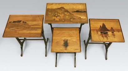 Émile GALLÉ (1846-1904) Quatre tables gigognes en marqueterie à décor de marines...