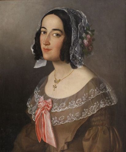 École Française du XIXe siècle Portrait de femme au ruban rose. Huile sur toile....
