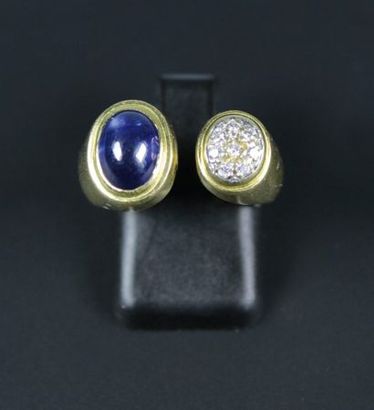 null Bague toi et moi en or jaune 18 K (750°) sertie d'un saphir cabochon et de diamants.
Poids...