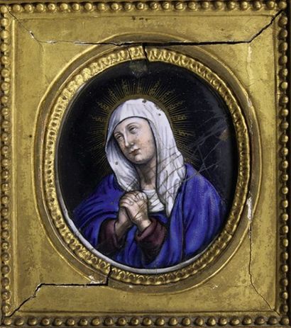ECOLE DU XVIIIe SIÈCLE 
Vierge en prière.
Email peint à vue ovale dans un cadre en...