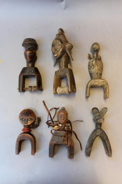 null Ensemble de 6 poulies de métier à tisser en bois sculpté.
Côte d'Ivoire