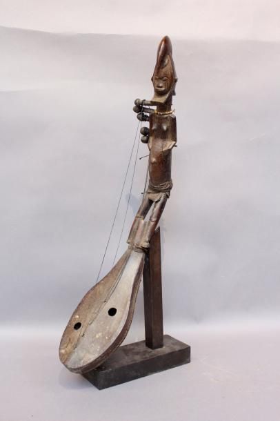 null Harpe Téké à double visage, RDC.
Long.: 71 cm