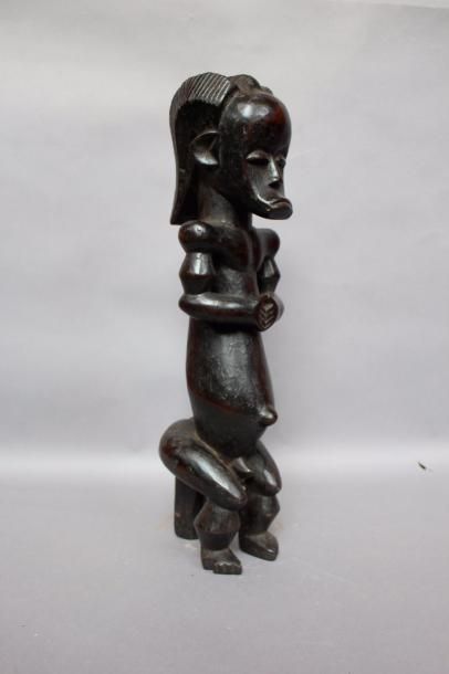null Byeri dans le style Fang, Gabon.
Bois sculpté.
Haut.:54 cm