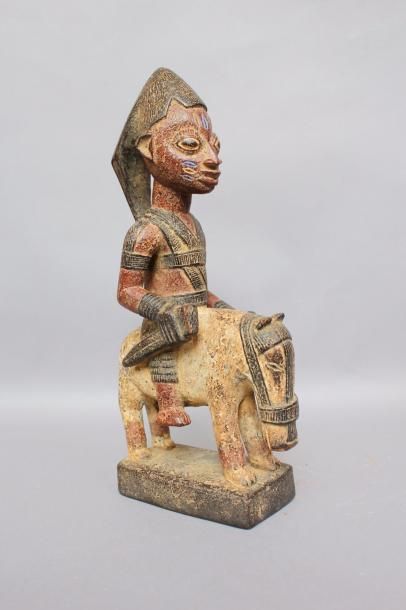 null Cavalier, Yoruba, Nigéria, bois sculpté polychrome.
Epoque tardive.
Haut.:40...