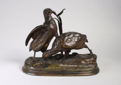 Jules moigniez (1835 - 1894) 
Couple de perdrix.
Bronze à patine brun foncé nuancé....