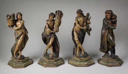 null Suite de quatre statuettes en bois sculpté et polychrome figurant les Quatre...