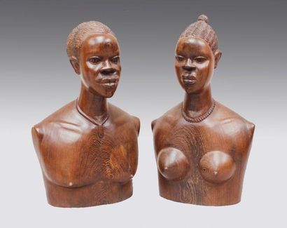 Ecole Africaine du XXe siècle Bustes d'africain et d'africaine.
Sculpture en taille...