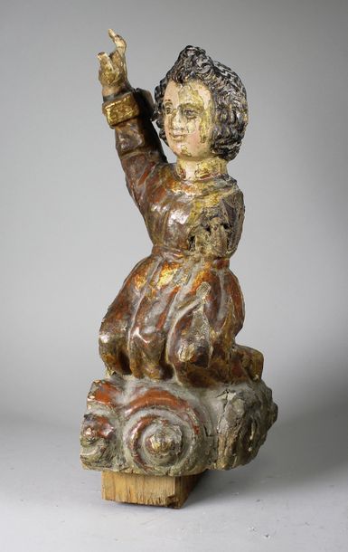 ECOLE DU XVIIIe SIÈCLE Saint sur un nuage.
Statue polychrome rehaussée d'or (manques).
Haut.:...