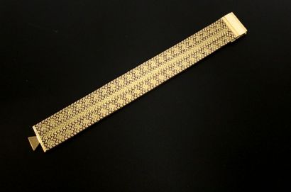 null Bracelet souple en or jaune 18 carats (750‰) amati et poli.
Long.: 19,5 cm -...