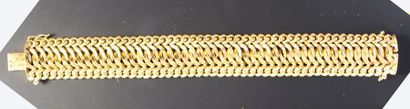 null Bracelet souple en or jaune 18K (750‰) à maille américaine.
Long.: 19 cm - Poids:...