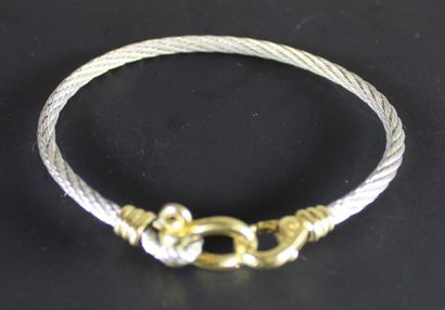 FRED Bracelet en acier tressé et or jaune 18K (750°/°°). Collection «Force 10».
Signé.
Vers...