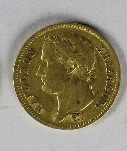 null Une pièce en or de 40 francs Napoléon Ier, 1812 (usures).