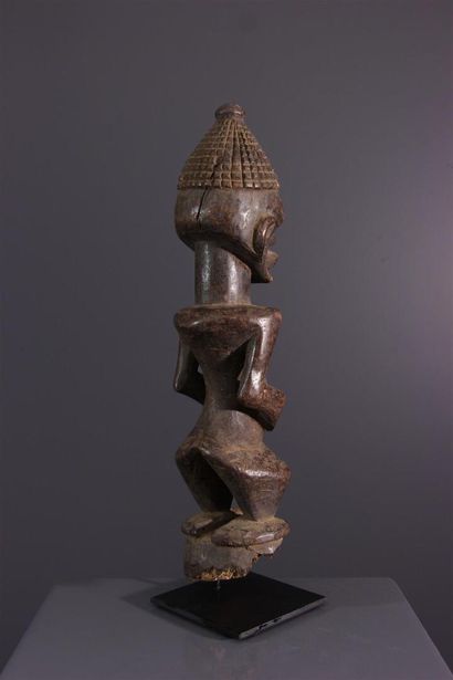 null Songye fetish statuette
A sculpture with a damaged base, it depicts a hermaphroditic...