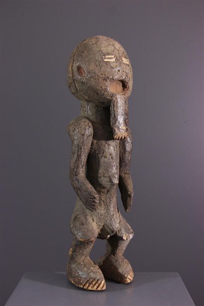 null Male figure Keaka, Kaakaa or Kaka, Cameroon.Standing on thick feet, this figure...