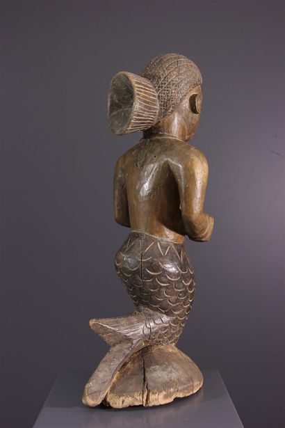 null Mamy Wata statue from Guinea
Mermaid figures in African artThe cult of Mami...