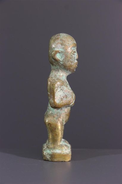 null Kongo bronze statuette
This small anthropomorphic African bronze sculpture is...