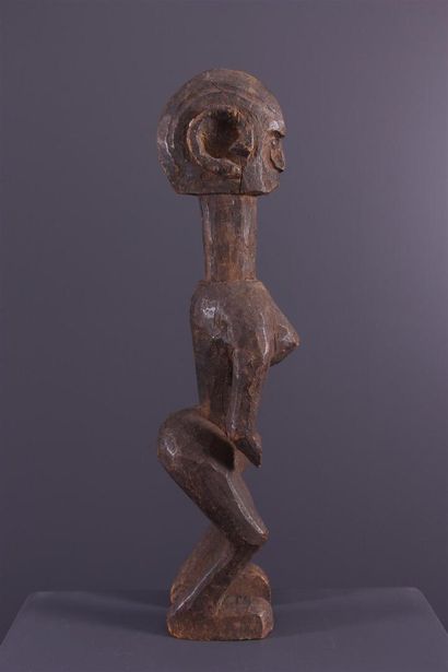 null Montol female figure, Nigeria
In an arched posture, this African female statue...