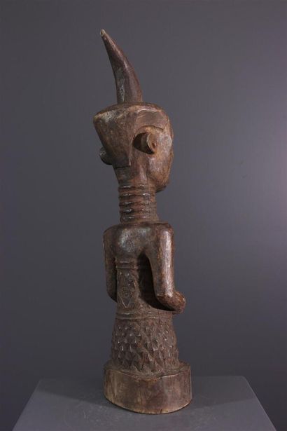null Ndengese Congo ancestor statue
The flared hairstyle topped by a horn is characteristic...